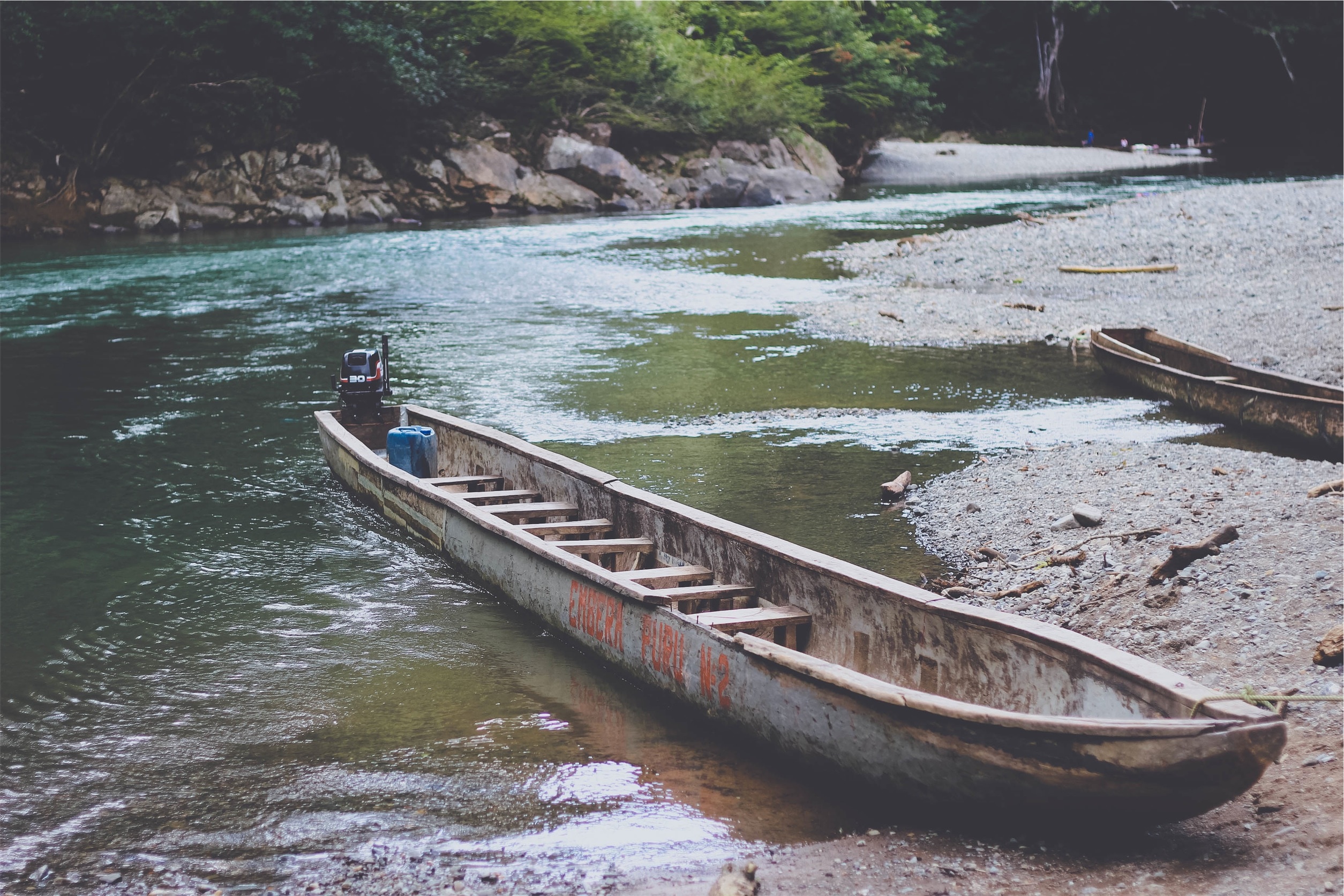 gray wooden canoe