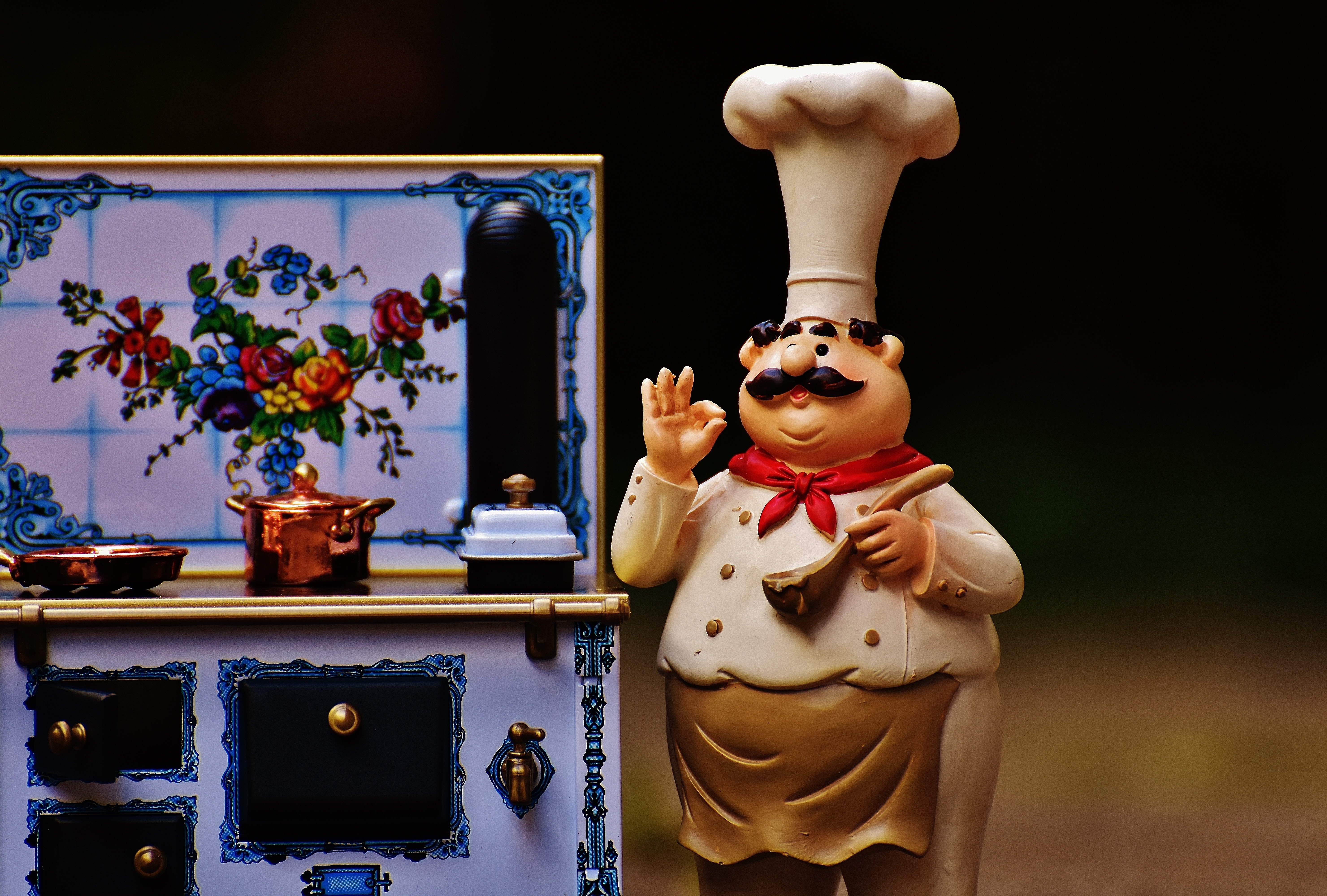 chef and with kitchen ceramic figurine