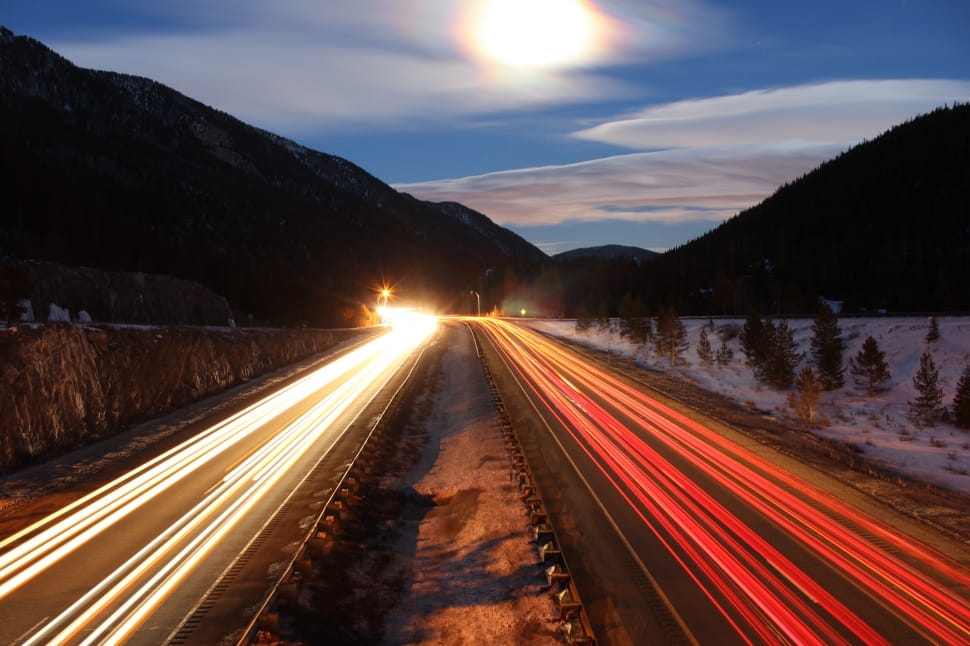 time-lapse photography of cars passing by preview
