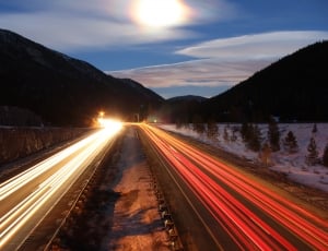 time-lapse photography of cars passing by thumbnail