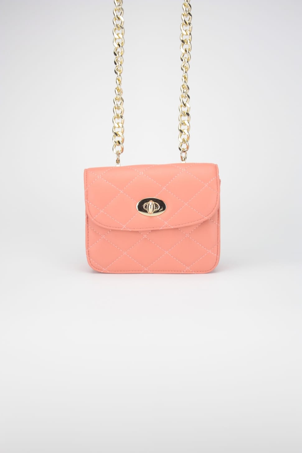 gold quilted pink leather bag preview