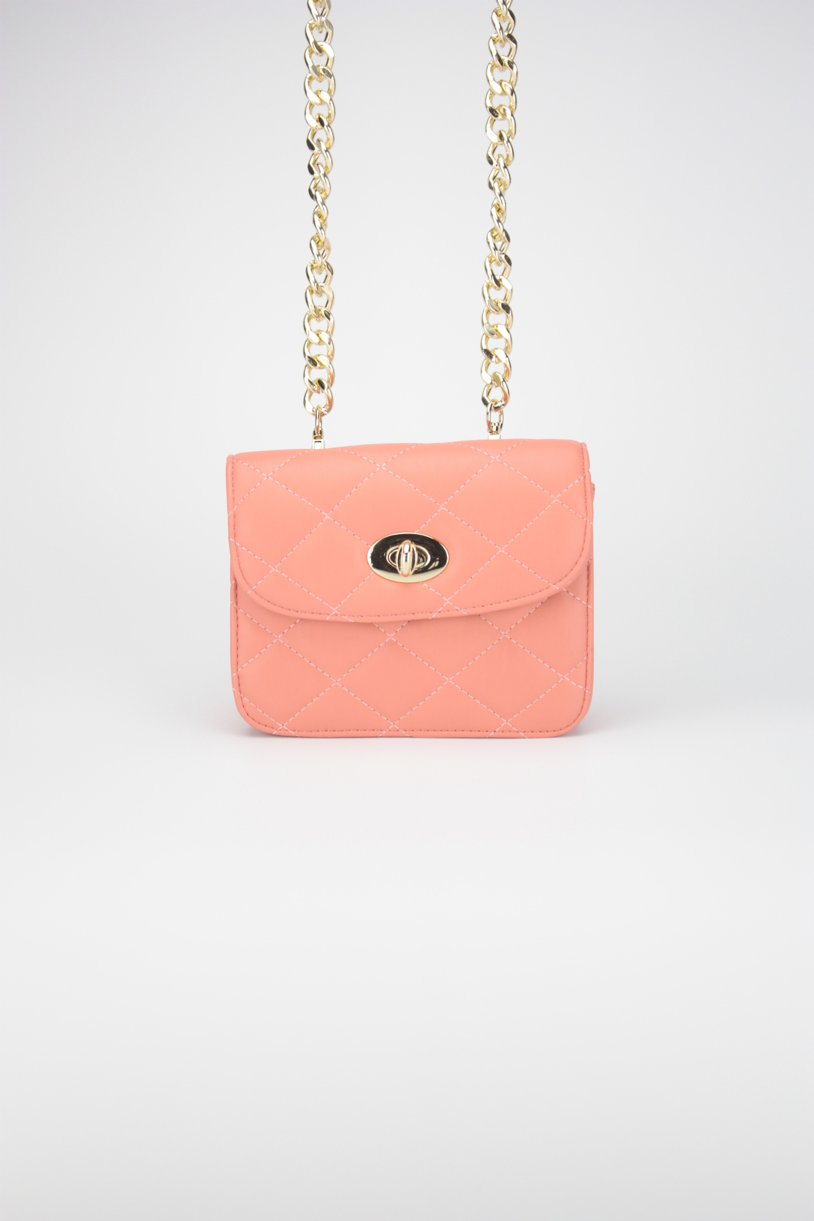 gold quilted pink leather bag