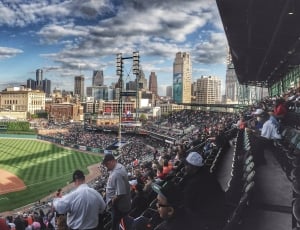fish lens photo of people in baseball field during day light thumbnail