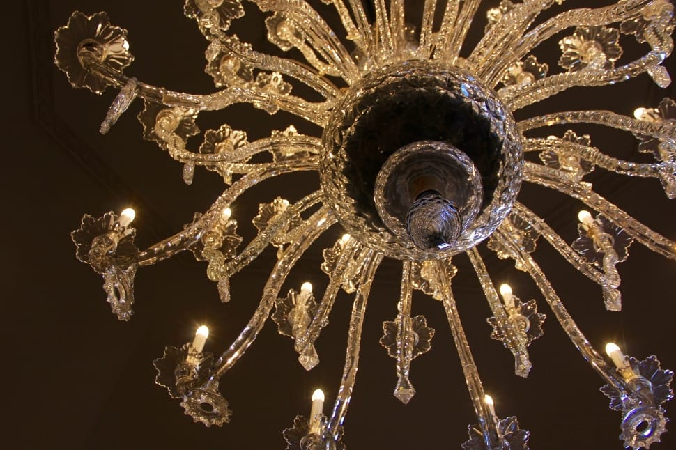 low angle view photography of gold-colored metal framed crystal chandelier preview