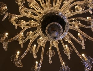 low angle view photography of gold-colored metal framed crystal chandelier thumbnail