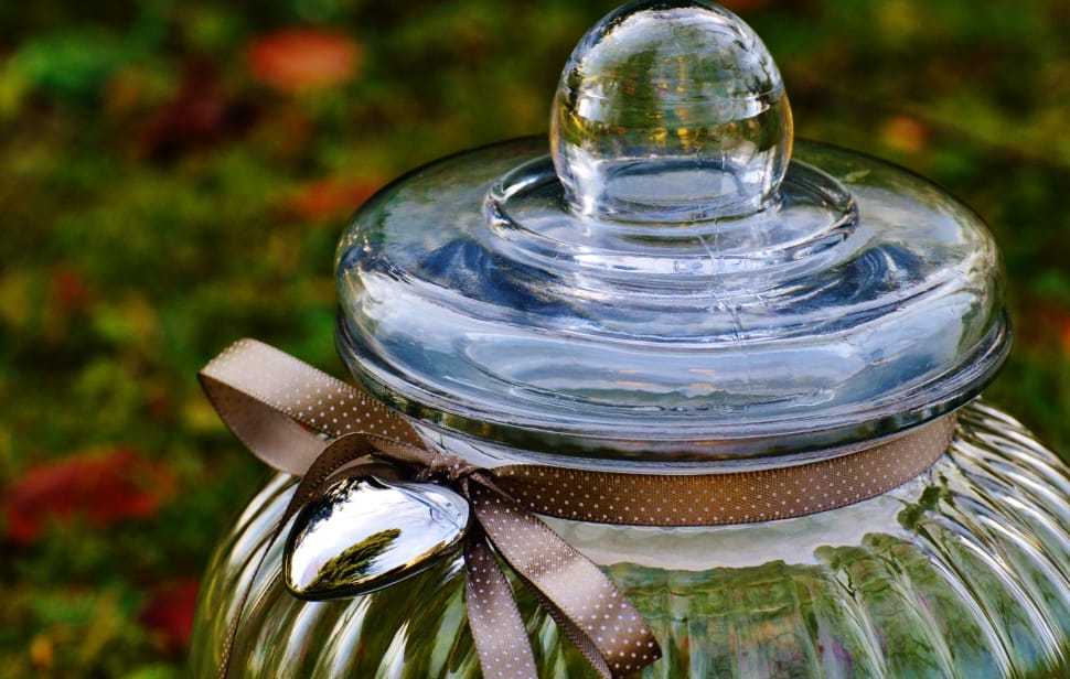 closeup photography of clear glass cooker jar preview