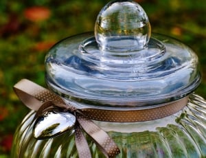 closeup photography of clear glass cooker jar thumbnail