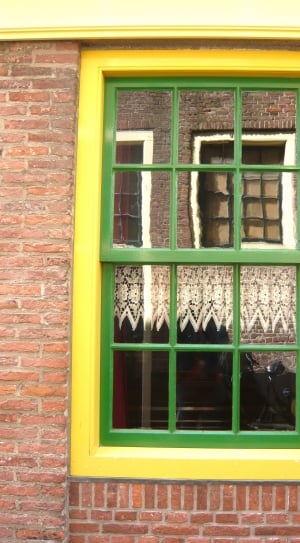 yellow and green painted window pane thumbnail