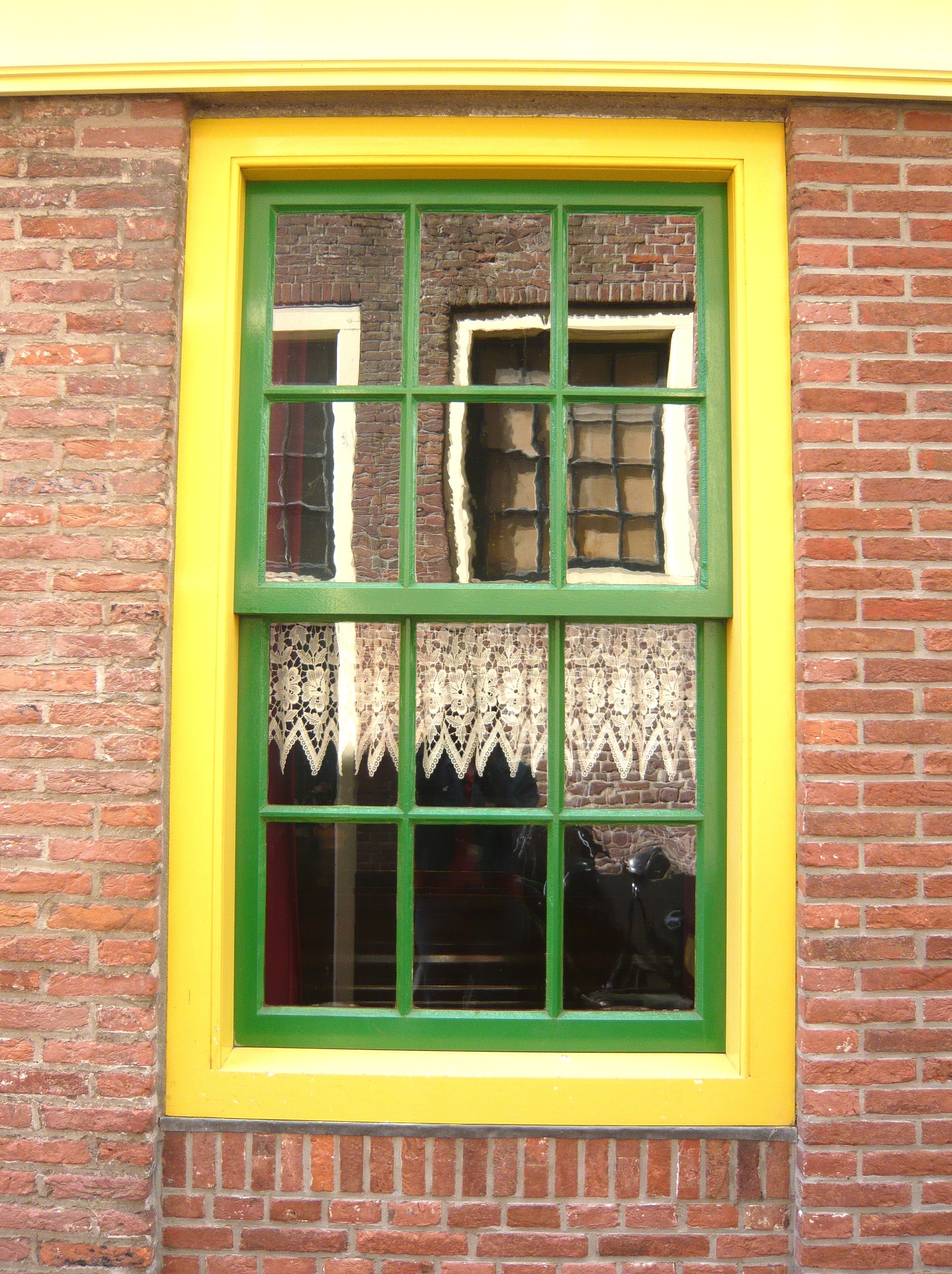 yellow and green painted window pane
