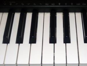 closeup photo of electronic keyboard thumbnail