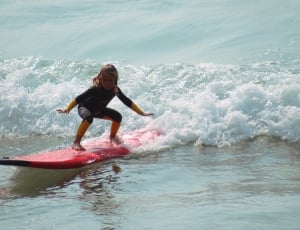 red and black surfboard thumbnail