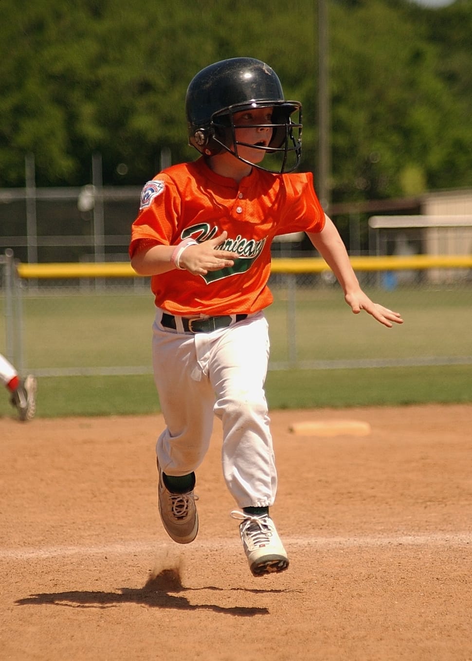 boy's orange and white baseball uniform preview