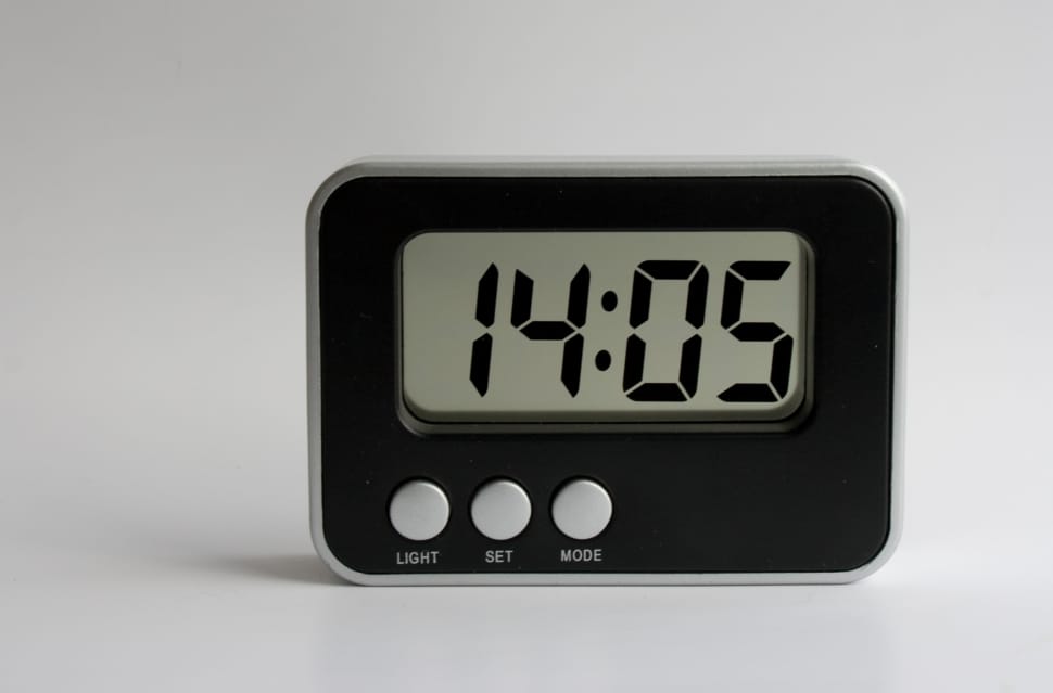 black and gray digital alarm clock preview