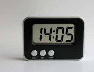black and gray digital alarm clock thumbnail