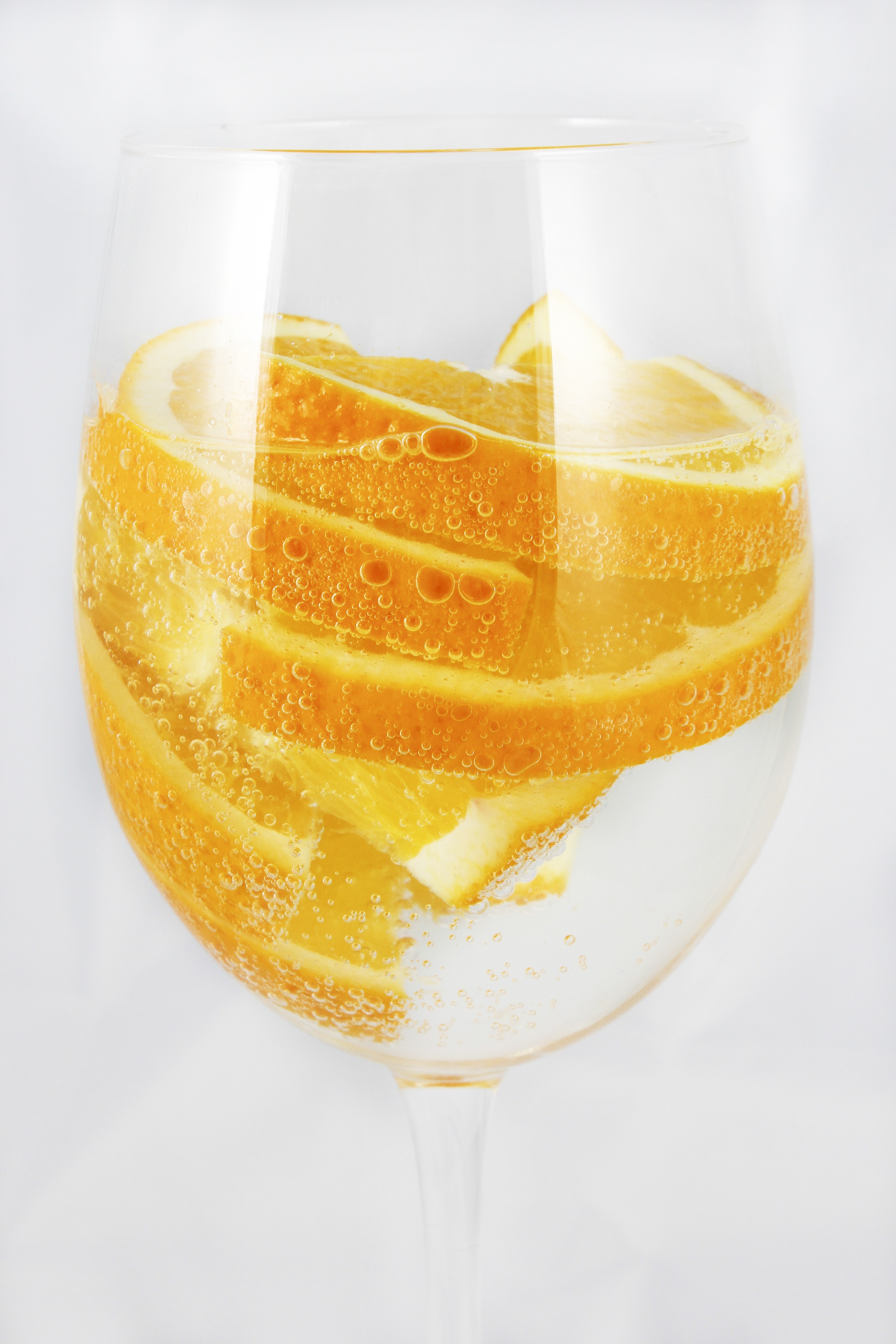 orange fruit in champagne flute