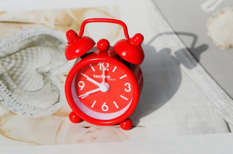 red and white bell alarm clock preview