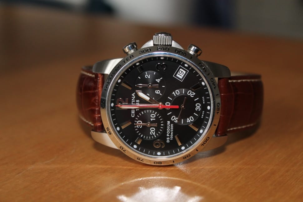 brown leather strap silver and black round chronograph watch preview