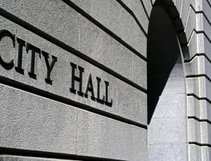 gray City Hall carved on a wall thumbnail