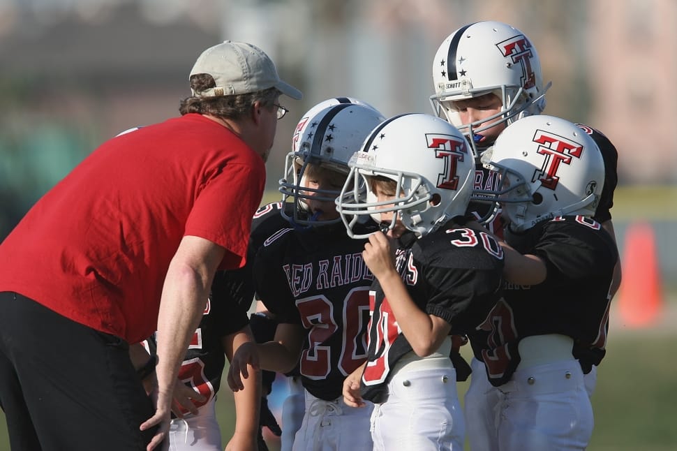 boy's black and red american football jersey free image - Peakpx