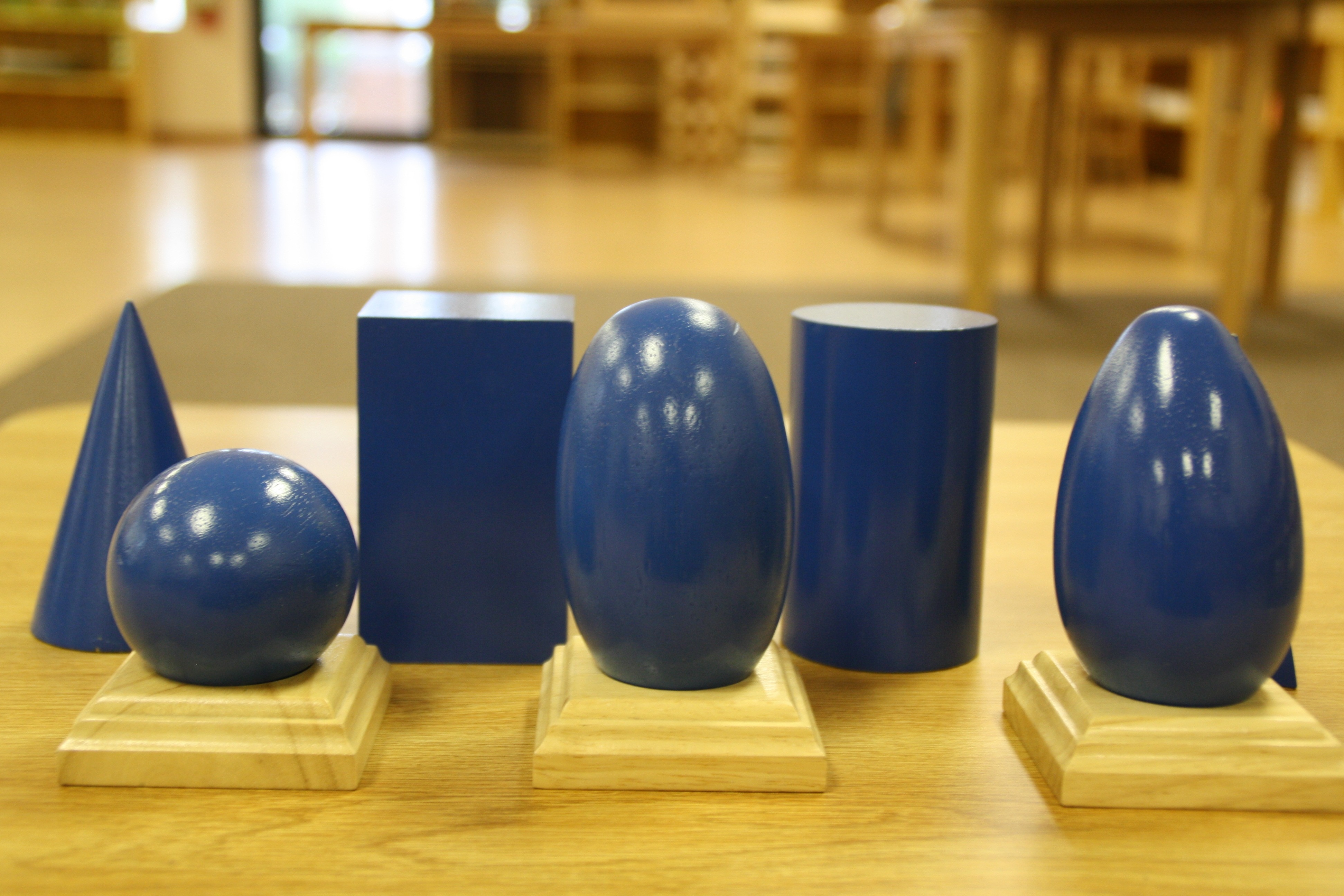 blue oval, square, cone and round case ceramic vase