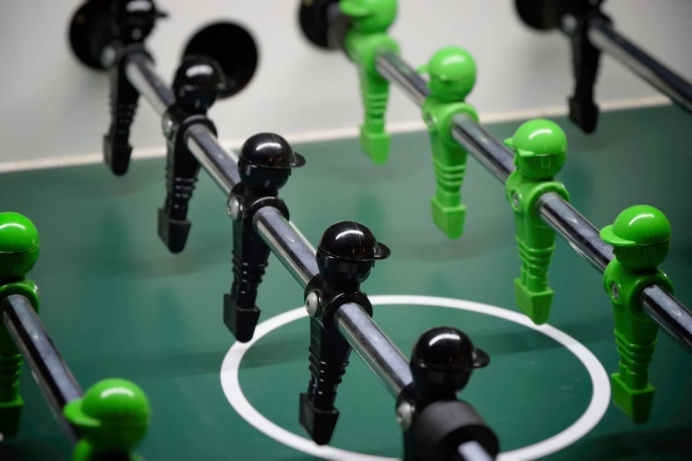 green and white foosball table preview