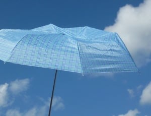 blue and white folding umbrella thumbnail