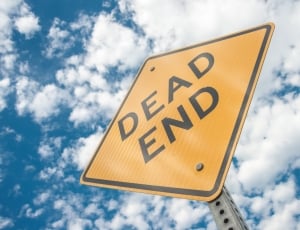 low angle photo of dead end signage thumbnail