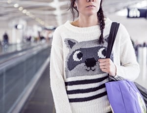 women's white and gray raccoon sweater thumbnail