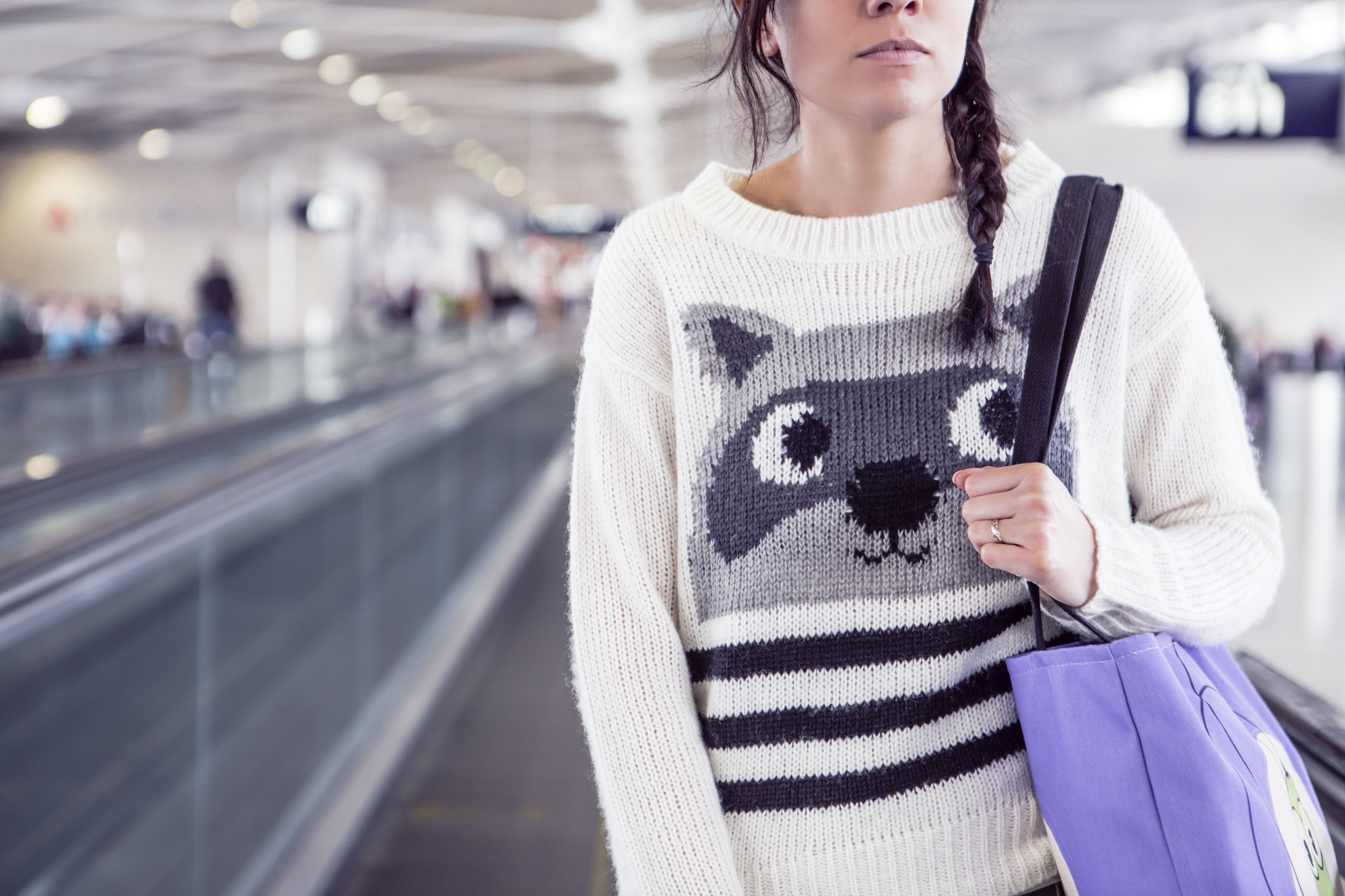 women's white and gray raccoon sweater