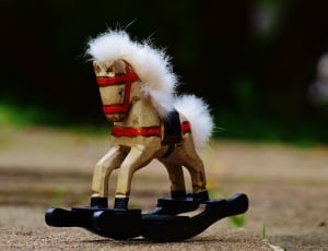 brown and black rocking horse toy thumbnail