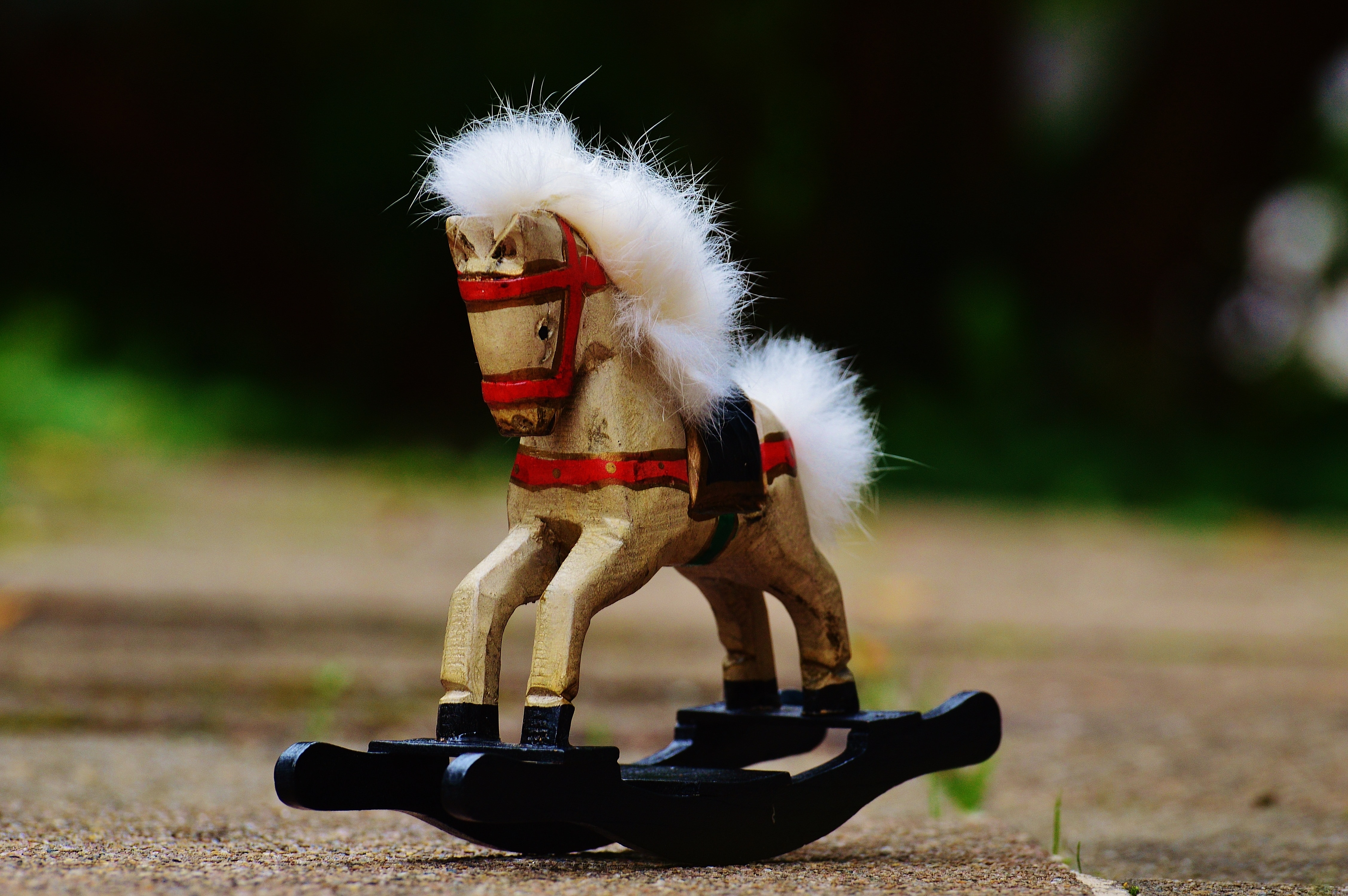 brown and black rocking horse toy