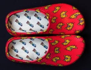 red and yellow cat print rubber clogs thumbnail