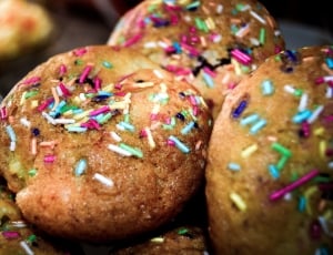 three brown donut with sprinkles thumbnail