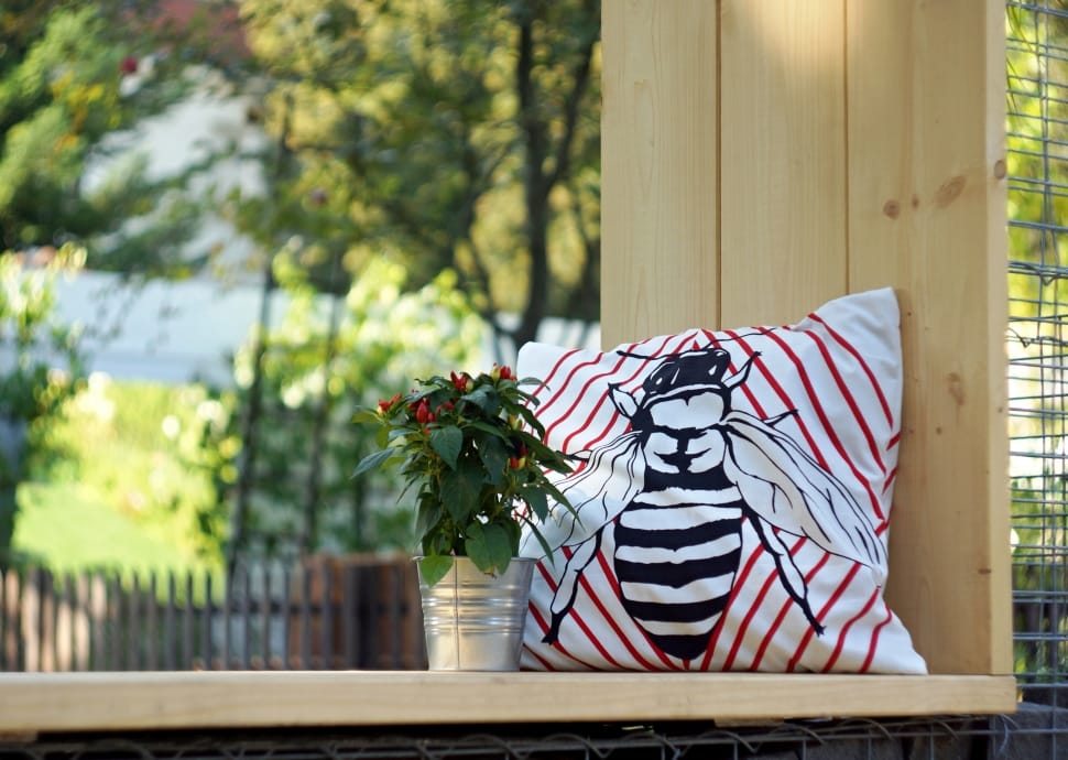 white red and black bee print throw pillow preview