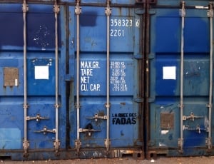 blue and gray metal cargo trailer thumbnail