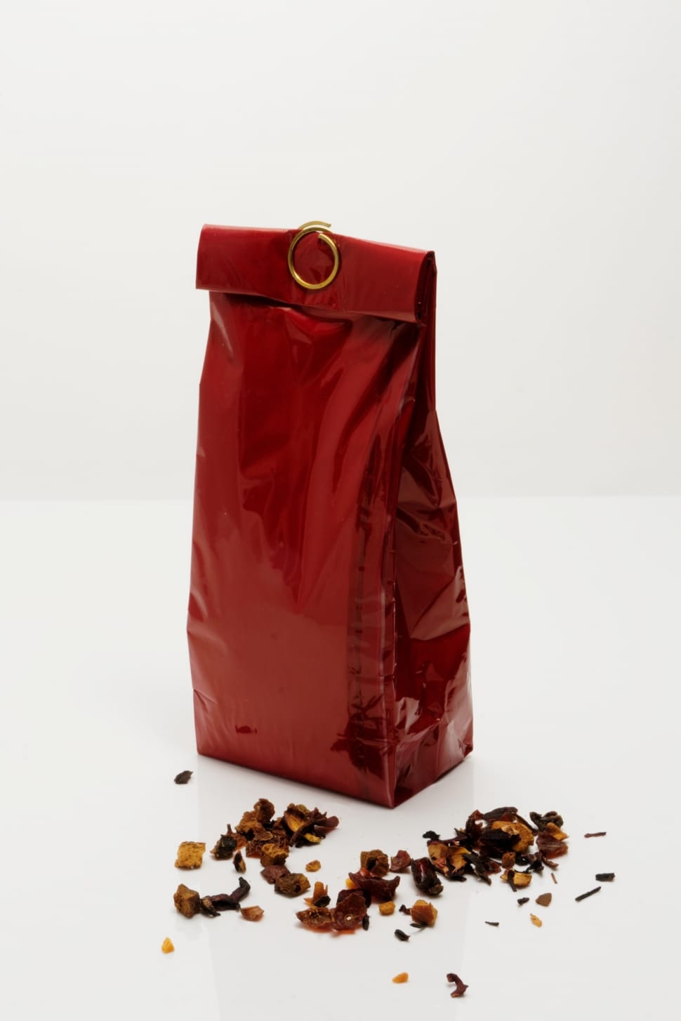 red plastic pack with brown seeds preview