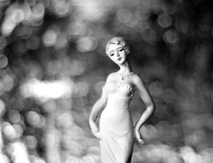 grayscale photo woman in tube dress thumbnail