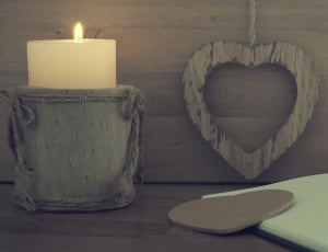 brown candle holder and heart pallet decor thumbnail
