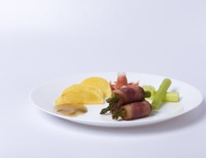 rolled  bacon in asparagos with spring onions and chips thumbnail
