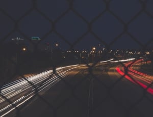 time lapse photo of road during nighttime thumbnail