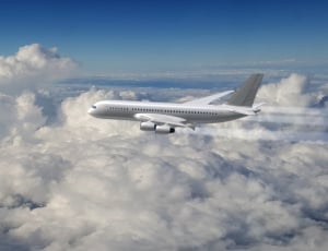white commercoal airplane thumbnail