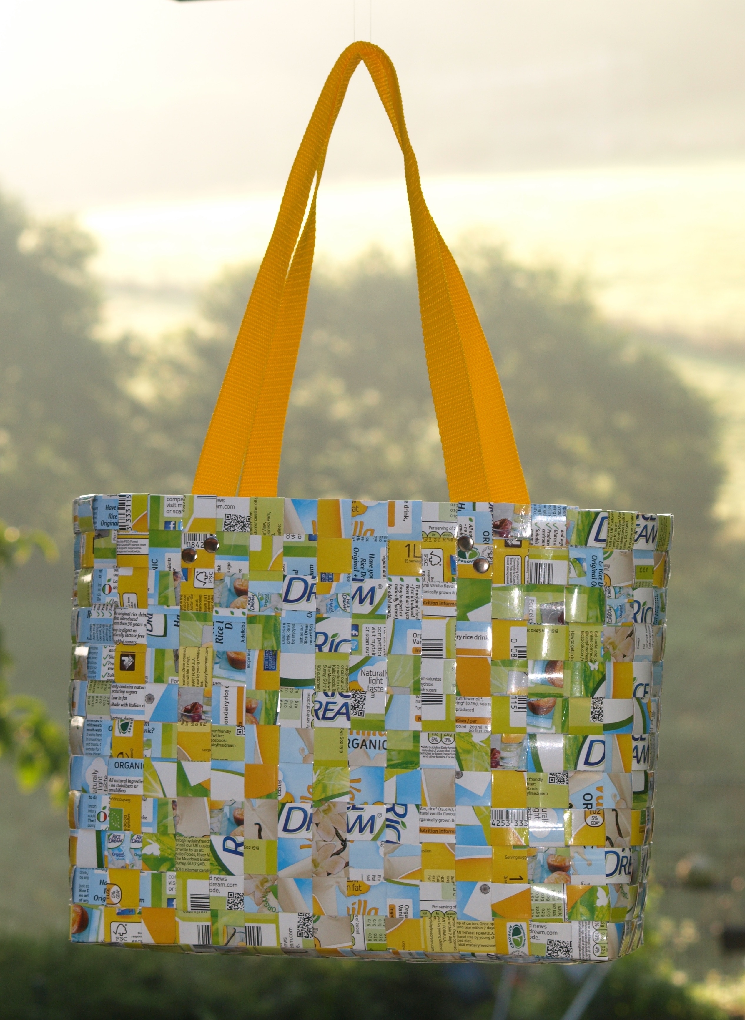 yellow and green recycled bag in focus photography