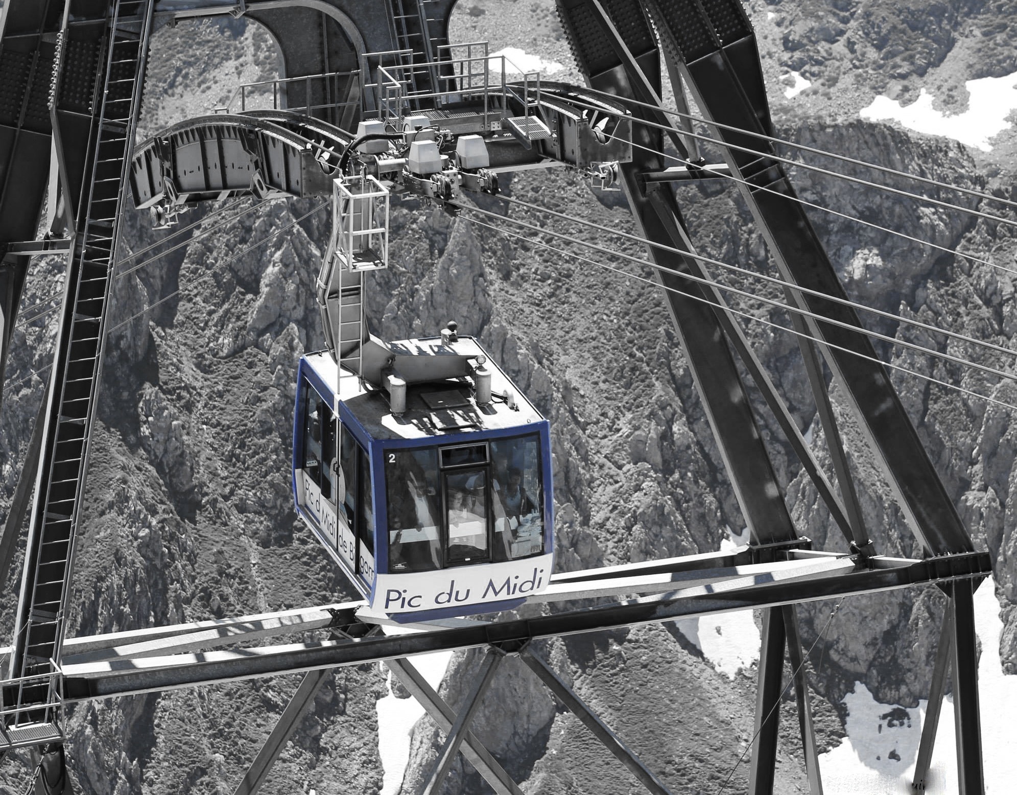 white and blue cable car