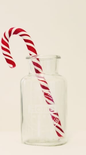 red and white candy cane and clear glass bottle thumbnail
