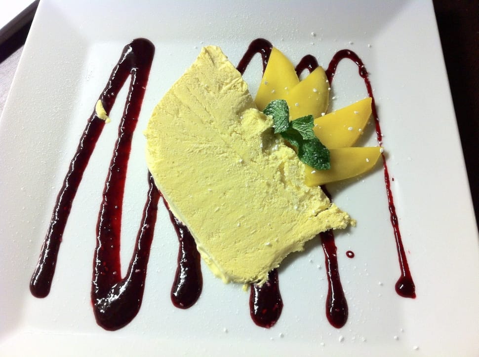 yellow crepe dessert pastry in white ceramic plate preview