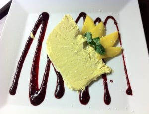yellow crepe dessert pastry in white ceramic plate thumbnail