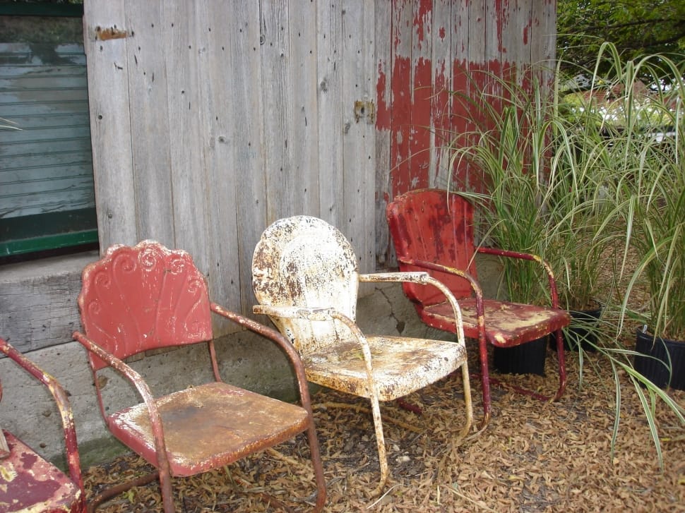 red and white metal chairs preview