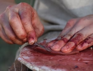 photo of a man slicing meat thumbnail