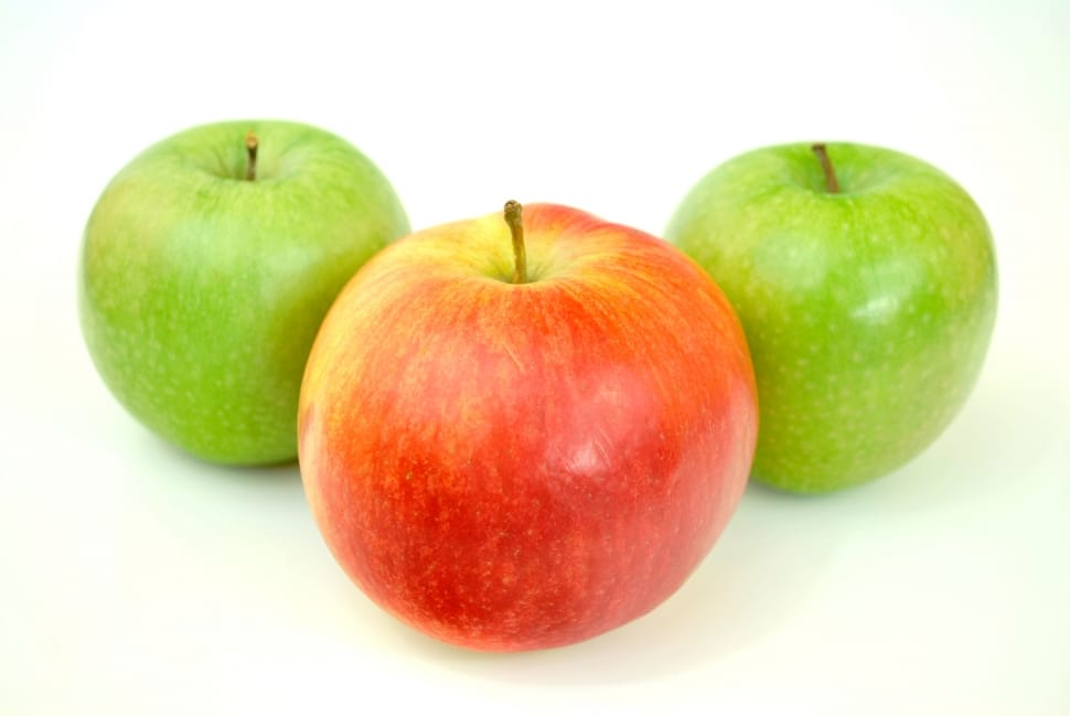 three green and red apples preview