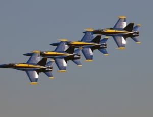four flying gray aircrafts thumbnail